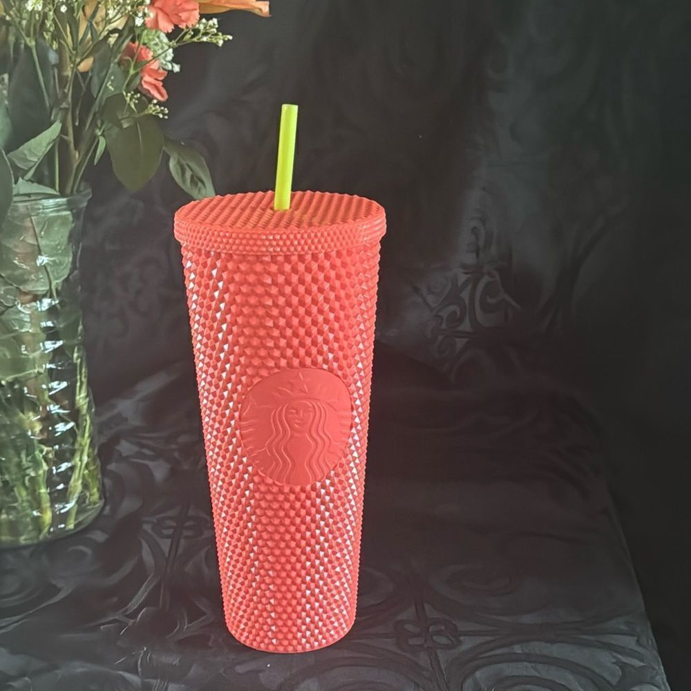 Bright pink  34 ounce starbucks tumbler